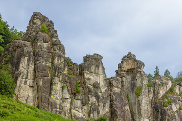 Fototapeta premium At the base of the Externsteine, a rock formation in the Teutoburg Forest near Horrn-Bad Meinberg