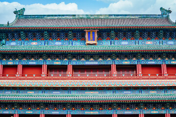 Traditional Chinese roof and painted architecture of the Zhengyang Gate (zhengyangmen) tower in...