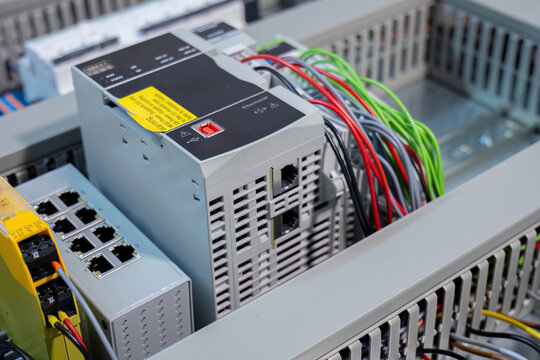 Industrial PLC system with connected network cables
