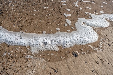 Seafoam on Beach