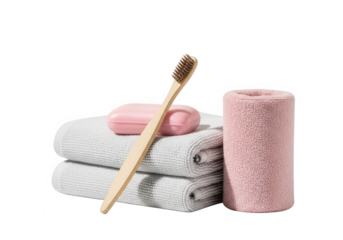 Bathroom essentials with towels and toothbrush isolated on transparent background