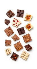 Assorted chocolate squares with nuts, caramel, and berries on a white background.