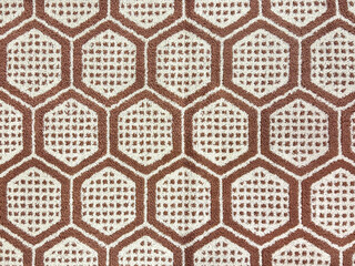 Graphic background with geometrical hexagon pattern in brown, maroon, and white color. Honeycomb shapes, hexagonal and nets shape. Seamless background texture.
