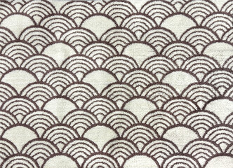 Graphic fabric with Japanese fish scales or Chinese fish skin wave and curve pattern, in brown and white color. Asian curved fan and fish scales pattern, in deep red and gold color. Seamless backgroun © TMR Studio