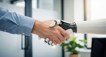 Human-Robot Partnership: A human hand clasps a robotic hand in a firm handshake, symbolizing a collaborative union in a modern office environment.
