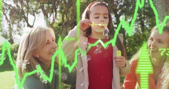 Blowing child in red top making soap bubbles in sunlit park with yellow wand, green overlays