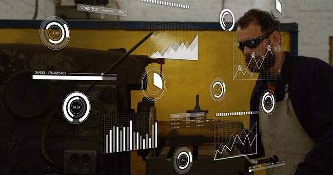 Leaning machinist using lathe control lever in shop, HUD, yellow screen, goggles, apron, copy space - Powered by Adobe