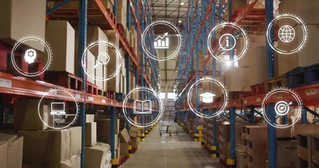 Showing center pallet racking and aisle in warehouse, with boxes, wheeled ladder, digital icons