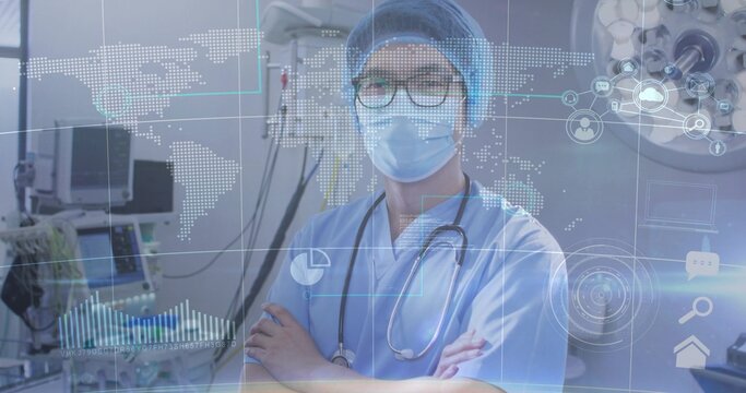 Standing surgeon wearing blue scrubs, bouffant cap, mask and stethoscope in OR with AR data