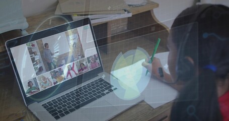 Writing kid at home wearing headphones using laptop HUD-overlay, green pencil and paper, copy space