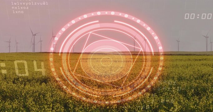 Projecting circular HUD overlaying farmland, showing canola field and wind turbines on horizon - Powered by Adobe