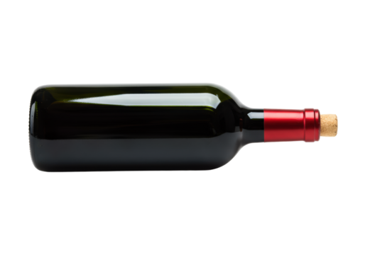 A full dark green glass bottle of red wine, sealed with a red foil capsule and natural cork, lying horizontally on a transparent background with copy space, concept for luxury wine advertising
