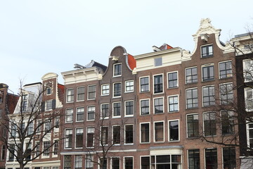 Keizersgracht Canal House Facades with Bare Trees in Amsterdam, Netherlands