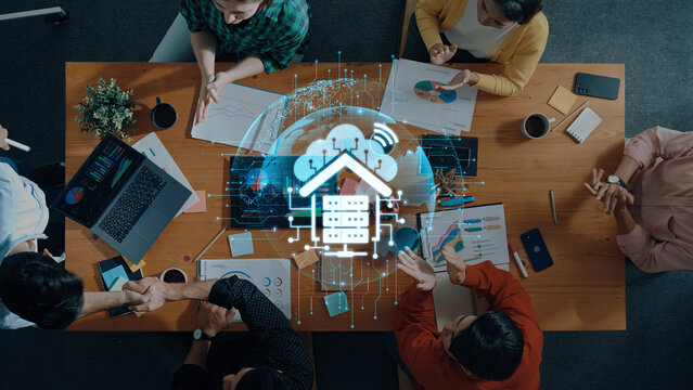 A diverse team collaborates in a modern office space, incorporating digital technology and data analysis tools to enhance productivity and ensure effective business outcomes. Trope