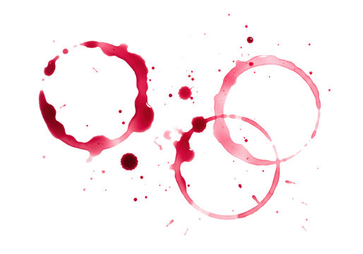 Three distinct red wine glass ring stains, crimson to ros&eacute;, with smudges and splatters forming abstract patterns on a transparent background with copy space, soft studio lighting. Concept of