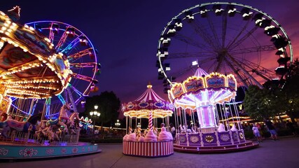 Twilight carnival neon carousel wheel glowing, vibrant illuminated fairground at dusk, spinning rides, vintage carousel horses, silhouetted ferris wheel, families enjoying festive lights, colorful - Powered by Adobe