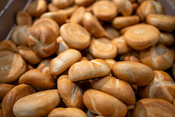 Freshly Baked Bread Rolls Displayed In Bakery.