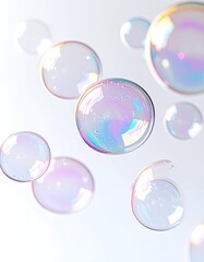 Floating, iridescent soap bubbles against a soft, white background