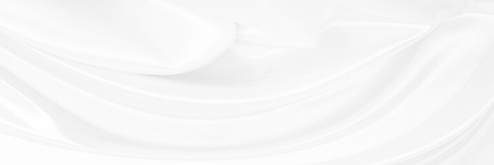 White gray satin texture that is white silver fabric silk background with beautiful soft blur pattern natural.