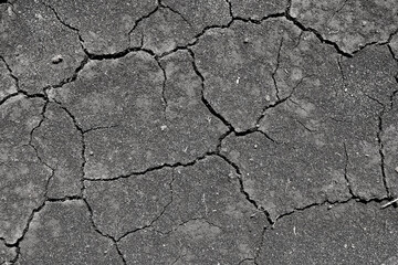 Wall texture soil dry crack pattern of drought lack of water of nature brown old broken background.