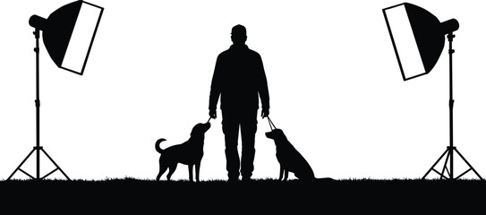 Silhouette of photographer with dogs in photo studio, professional pet photography setup with lighting equipment, creative animal portrait session