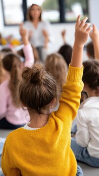 Classroom scene with students raising hands to answer questions during a lesson in a bright, modern learning environment