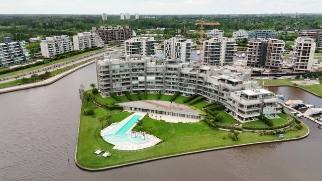 Beautiful Aerial Shot of Luxury Apartment Buildings and Marina, In Nordelta Bay, Buenos Aires, Argentina - Miami style.