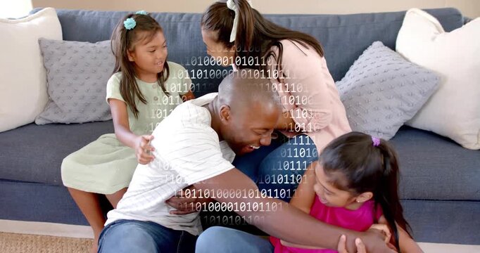 Dad reaching for girl in pink on sofa, initiating tickling for family health, binary overlaying