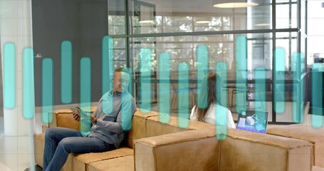 Male using tablet, leaning to colleague in office, seeking input, starting teal bars overlaying