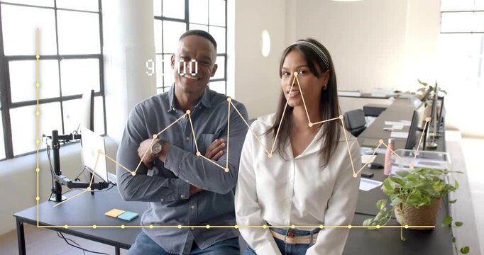 Man and woman sitting on desk nodes appearing mapping torsos face numbers updating for biz smiling