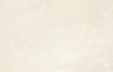 Soft beige handmade paper texture with visible fibers and natural organic surface, suitable for stationery, crafts, backgrounds, packaging, artistic prints, and minimal eco design projects.