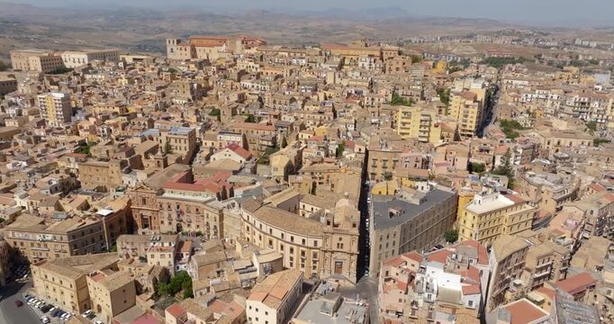 Aerial view of the historic center of Agrigento, Sicily, Italy. This Sicilian capital, located on a hilltop, was known in ancient times as Akragas. It's a beautiful, sunny summer day.