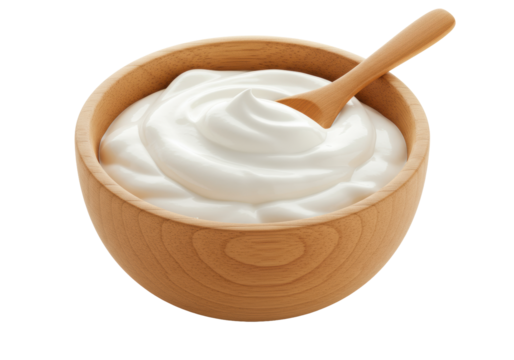 A natural light brown wooden bowl with organic grain, overflowing with thick creamy white whipped cream with soft peaks, matching spoon, on transparent, concept of natural deliciousness