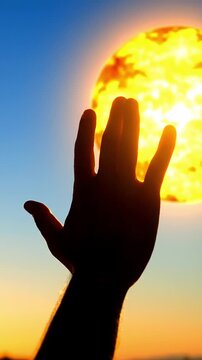 Hand Silhouette Making Vulcan Salute Gesture Against Brilliant Star or Sun in Cosmic Sky Symbolizing Live Long and Prosper Hope and Future Exploration