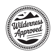 Wilderness approved emblem with mountains and laurel wreath