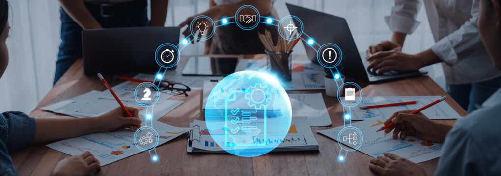 A diverse team engaged in a dynamic meeting, utilizing technology and digital tools to enhance creativity and productivity. Focus on collaboration and innovation. Trope