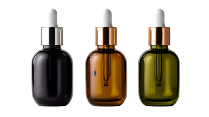 Three colorful glass bottles with dropper isolated on black background