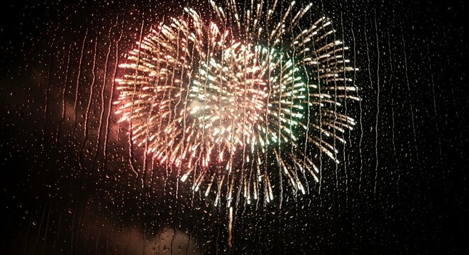Colorful fireworks bursting in night sky celebrating festival with bright explosions and glowing smoke - Powered by Adobe