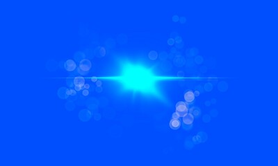 Bright lens flare on a vibrant blue background. Lens flare with light beams and glowing effect