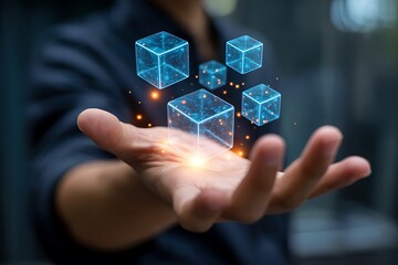 Hand holding glowing blockchain cubes | data technology network