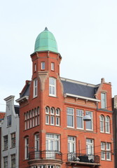 Leidsestraat Red Brick Corner Building with Tower in Amsterdam, Netherlands
