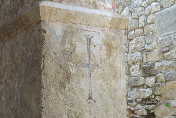 Medieval frescoes depicting a cross in the Church of St. Nicholas in Myra. Demre, Antalya, Turkey. Byzantine wall painting. History of religion and artistic concept.
