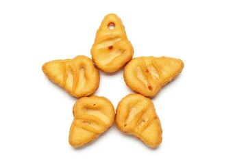 Christmas Food Concept Star made of five chicken nuggets on white background for fast food snack concept and tasty delicious unhealthy kids meal and fastfood restaurant menu