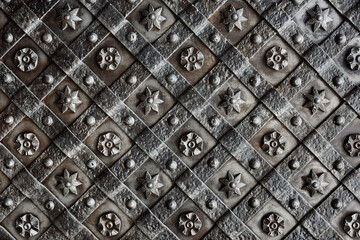 Metal door embossed ornament background texture