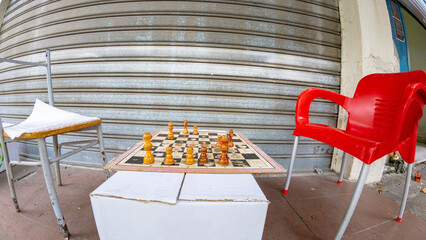 Unfinished chess game on a chessboard