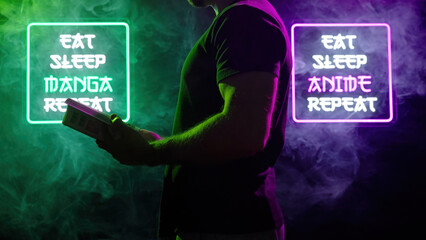 Person reading manga between two futuristic neon signs Eat Sleep Manga Repeat and Eat Sleep Anime Repeat