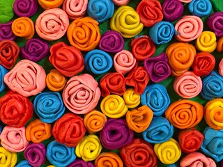 Closeup of cheerful fabric coiling with rich color palette