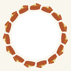 A wreath of pumpkin pies with whipped cream on top. The pies are arranged in a circle and are all the same size
