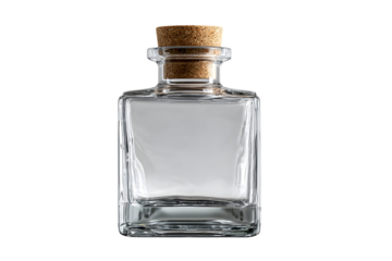 Clear glass square bottle with cork stopper on black background