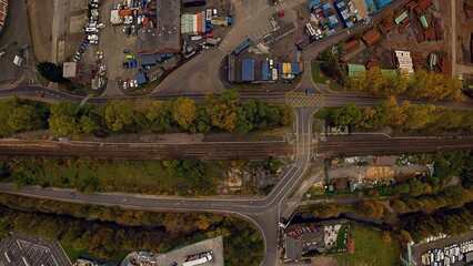 An aerial view looking straight down over a section of railway line in an industrial area of Middlesbrough, UK
